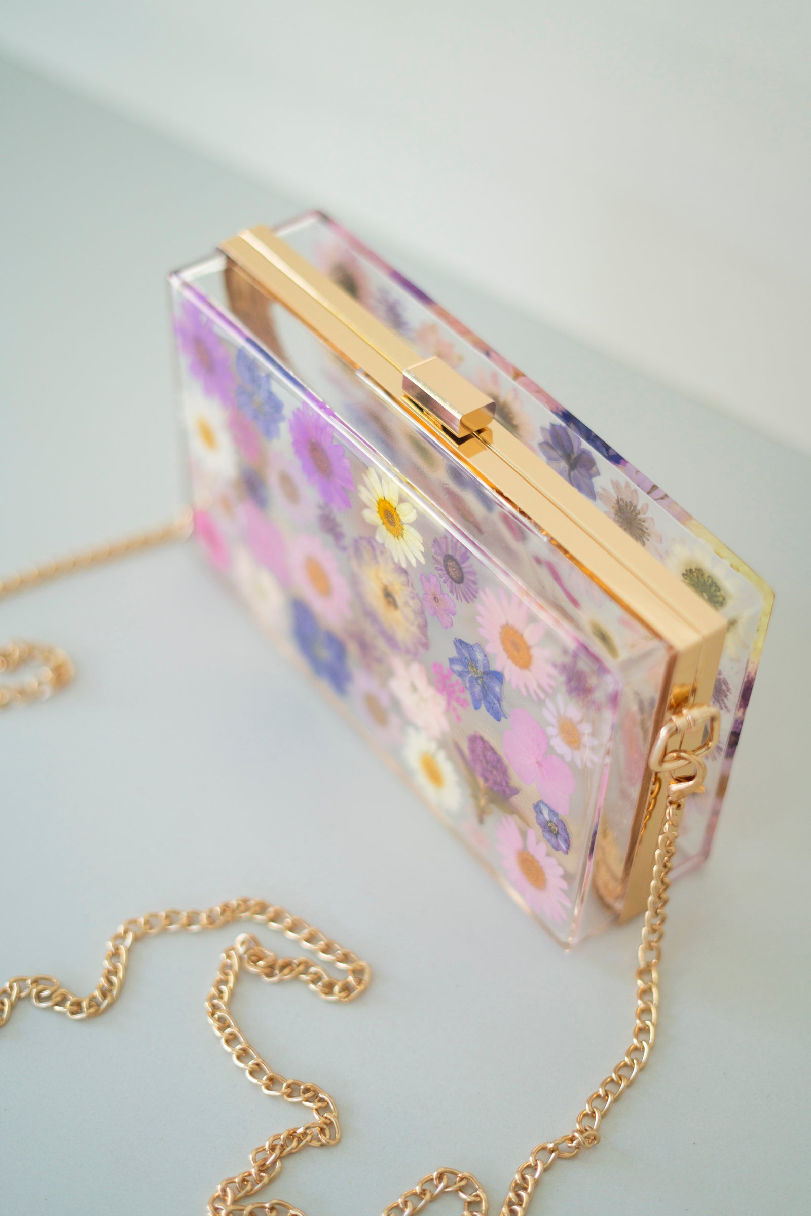 PURPLE/PINK FLORAL CLUTCH – By Margaux