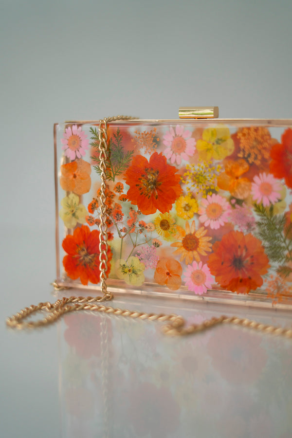 ORANGE/PINK FLORAL CLUTCH