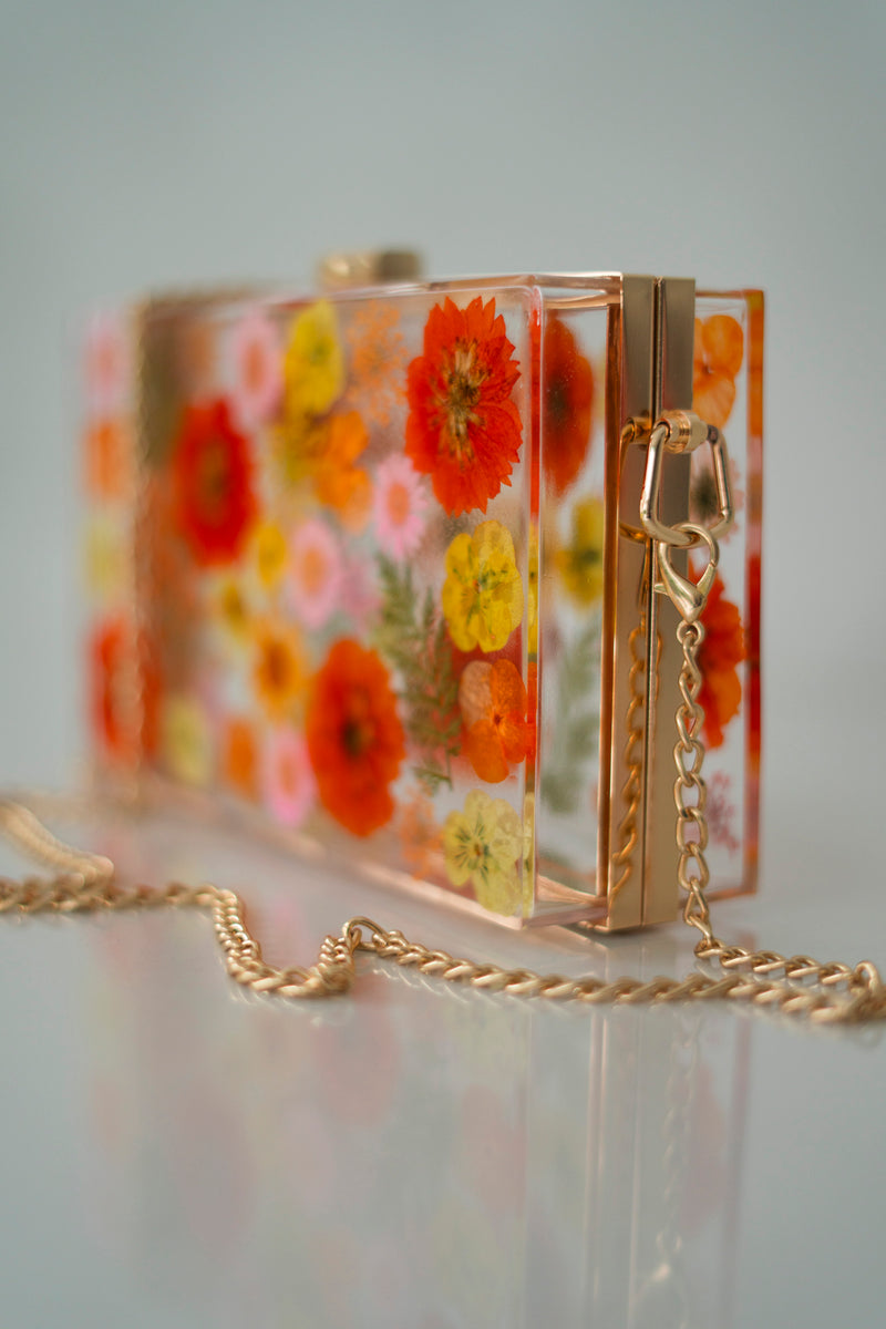 ORANGE/PINK FLORAL CLUTCH