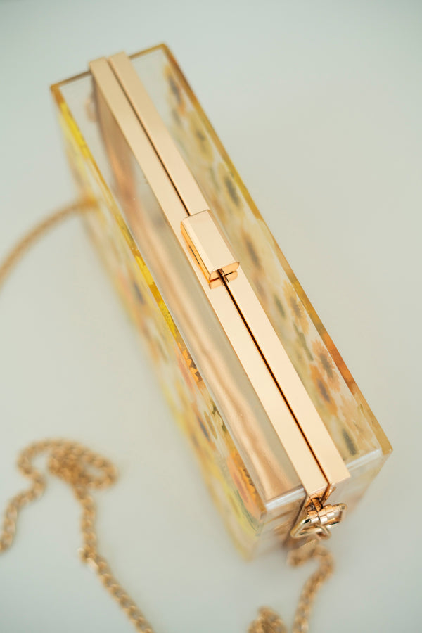 GOLDEN HOUR FLORAL CLUTCH