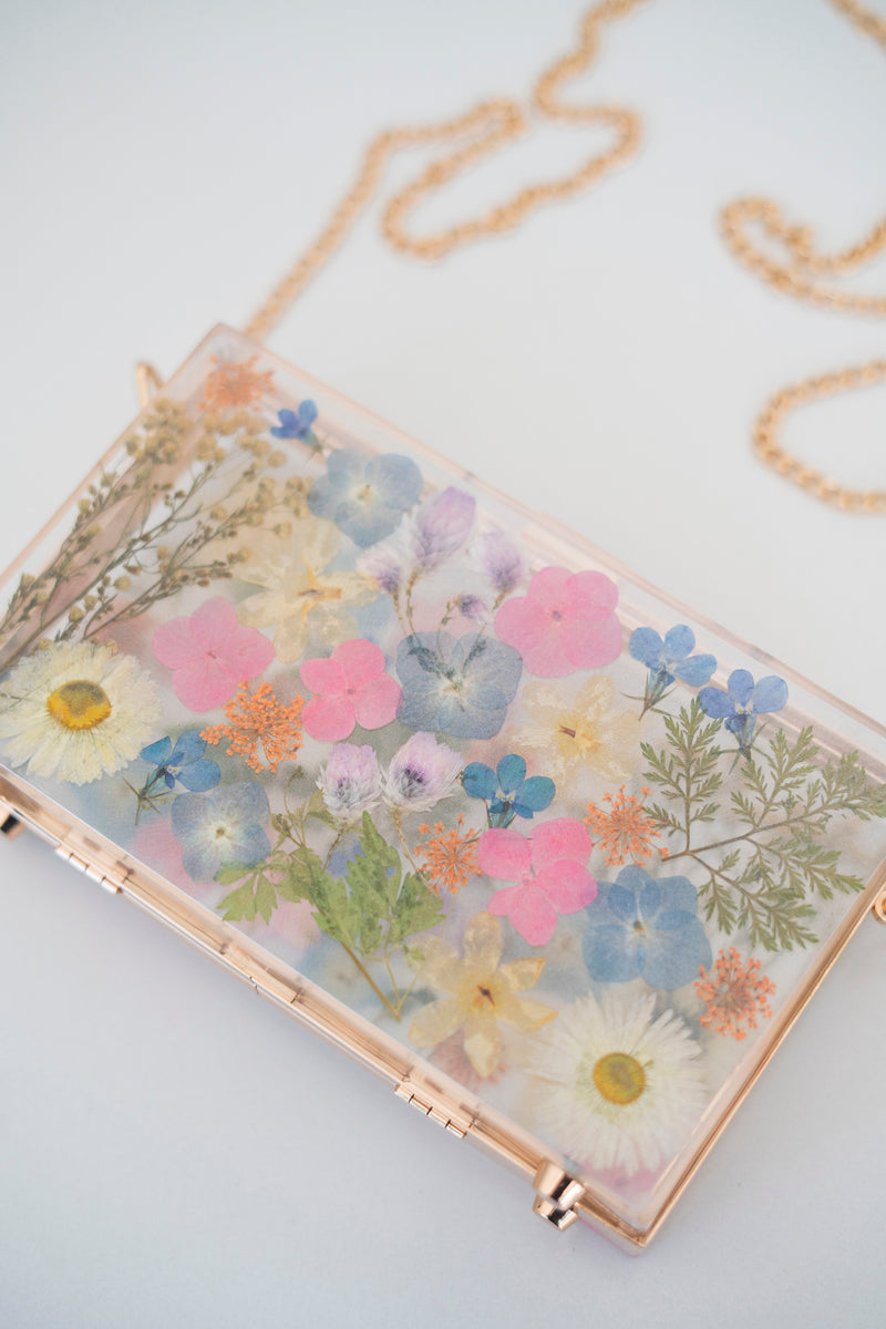 WILD FLORAL CLUTCH