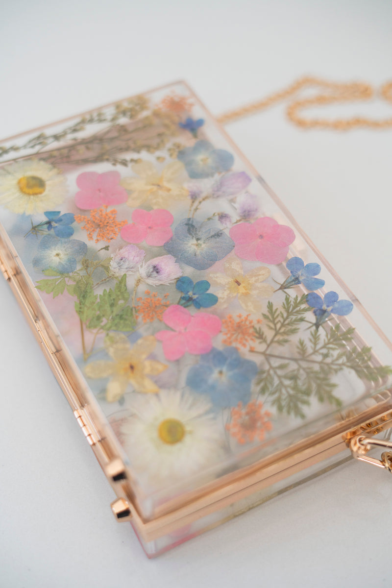 WILD FLORAL CLUTCH