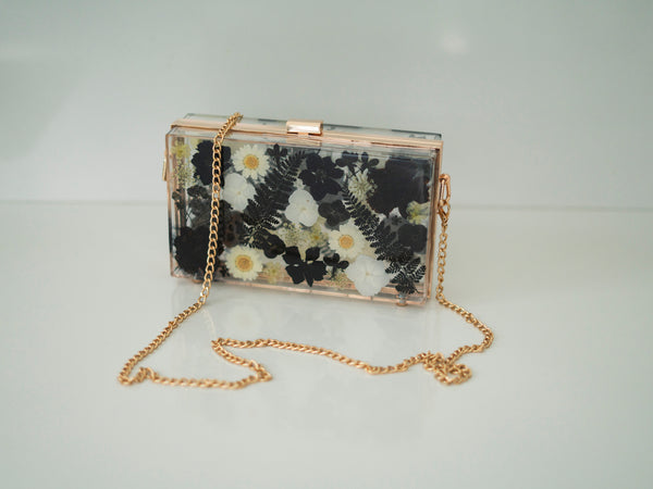 BLACK/WHITE FLORAL CLUTCH