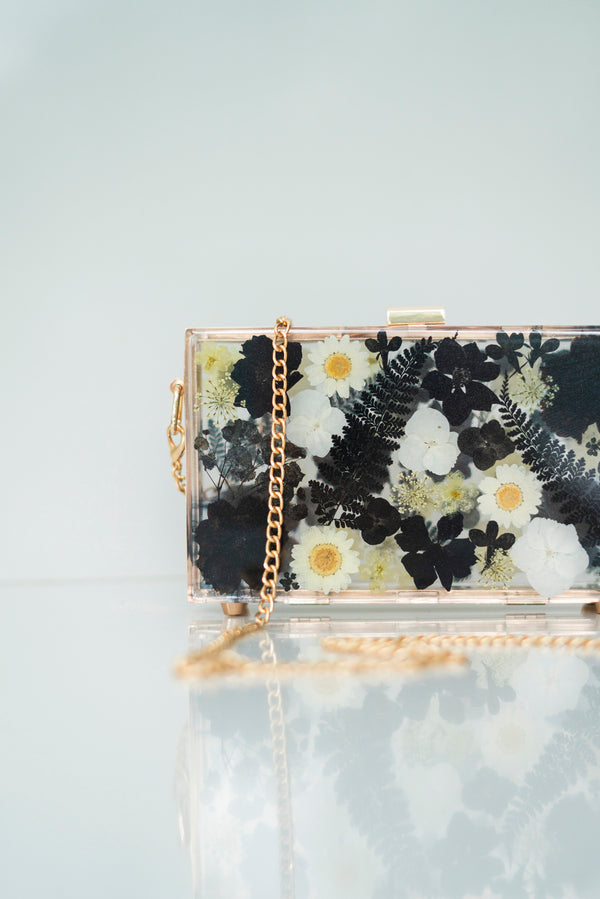 BLACK/WHITE FLORAL CLUTCH