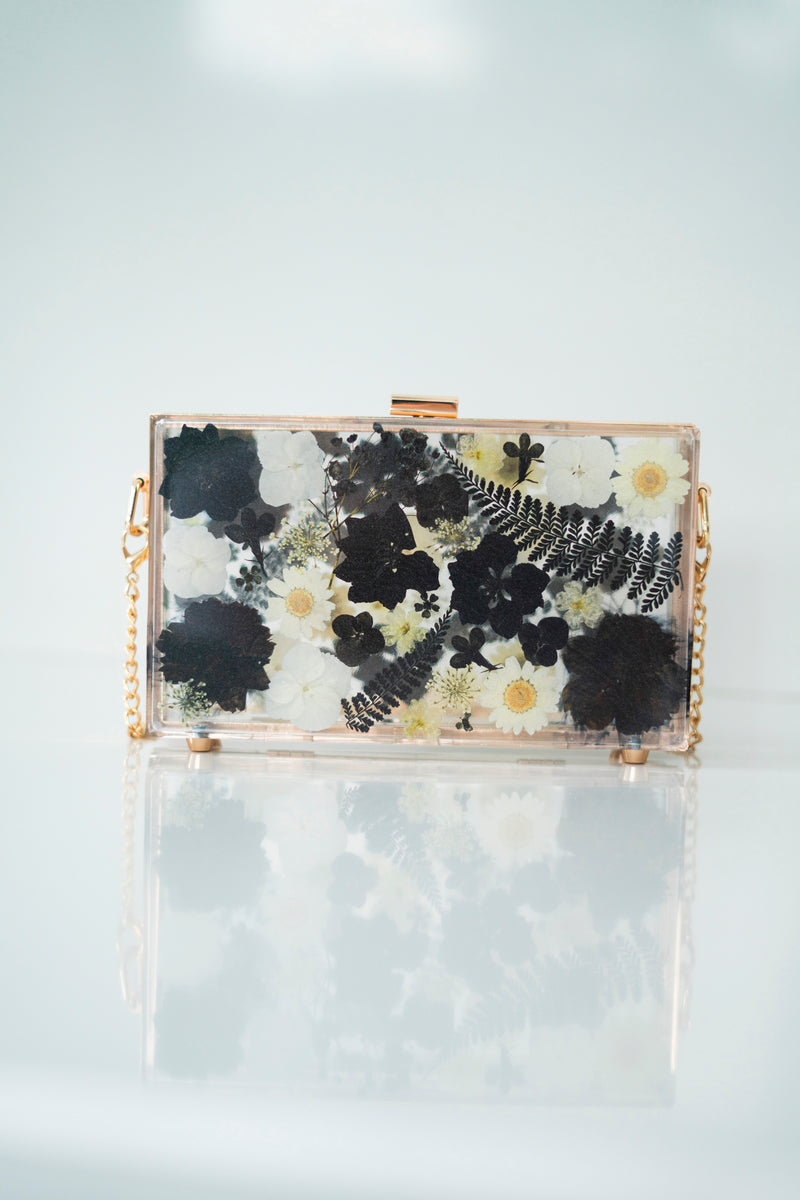 BLACK/WHITE FLORAL CLUTCH