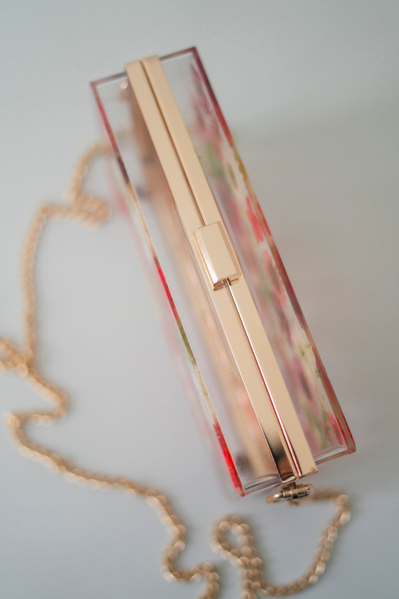 RED/WHITE FLORAL CLUTCH