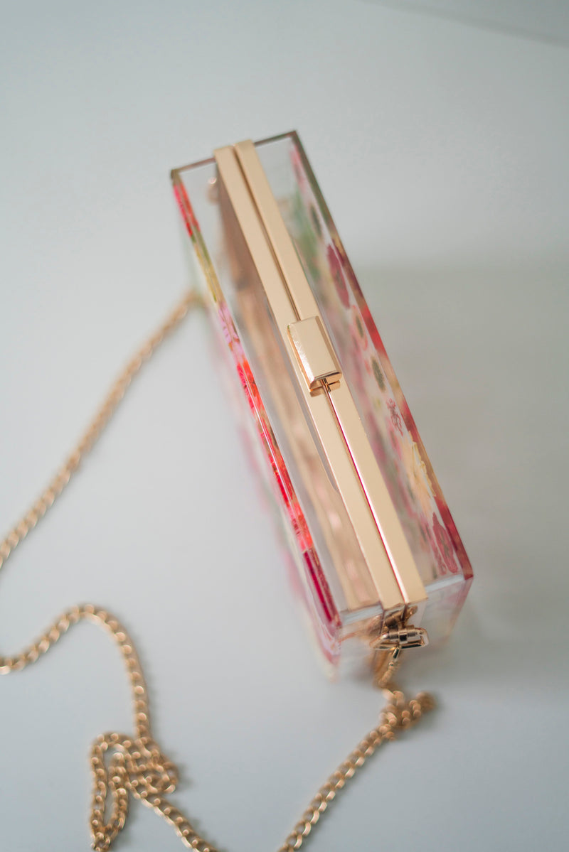 SOFT RED FLORAL CLUTCH