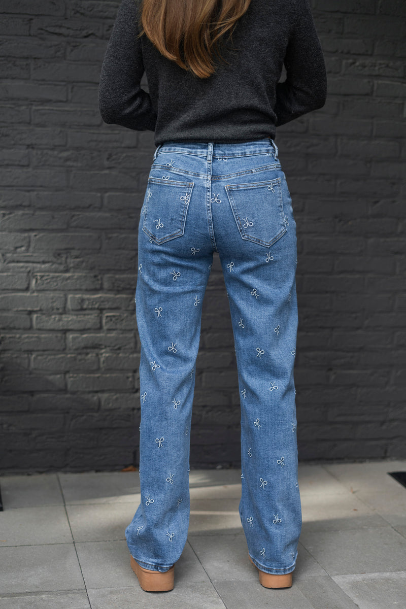 EMBROIDERED BOW JEANS