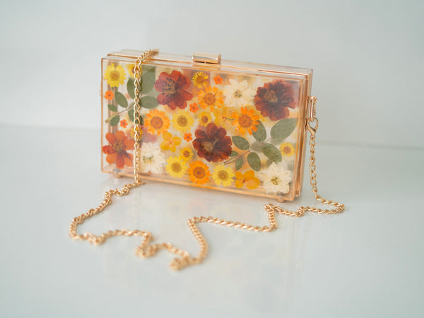 GOLDEN SUNRISE FLORAL CLUTCH
