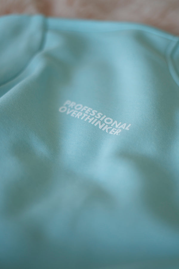 PROFESSIONAL OVERTHINKER BLUE SWEATER