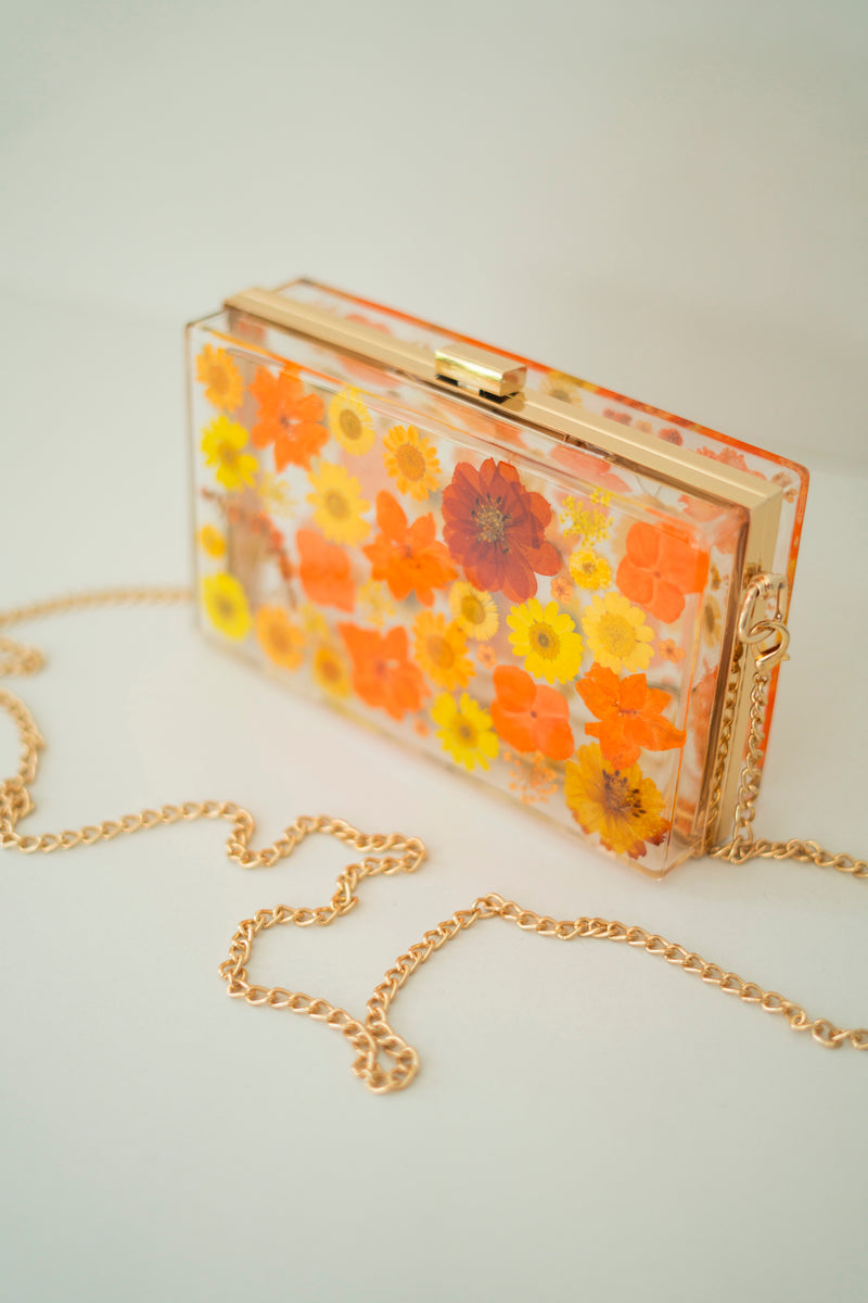 ORANGE FLORAL CLUTCH