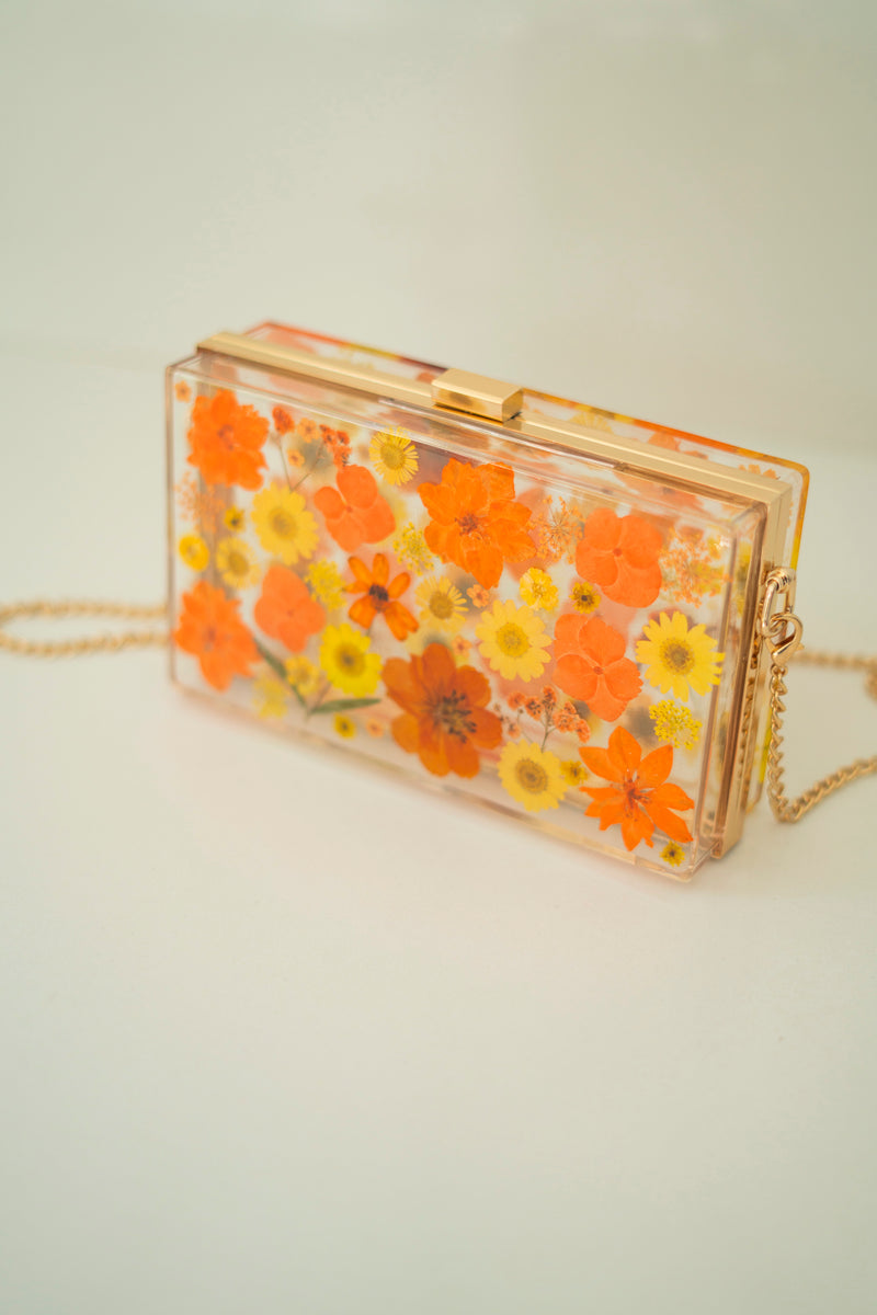 ORANGE FLORAL CLUTCH